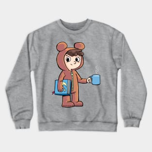 boy prepares for bed with a cup of warm milk and a picture book Crewneck Sweatshirt